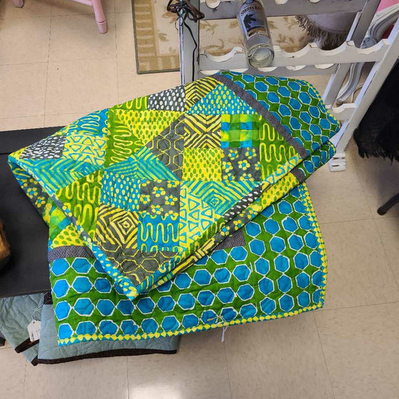 Bright blue and green quilt. 53 x 74